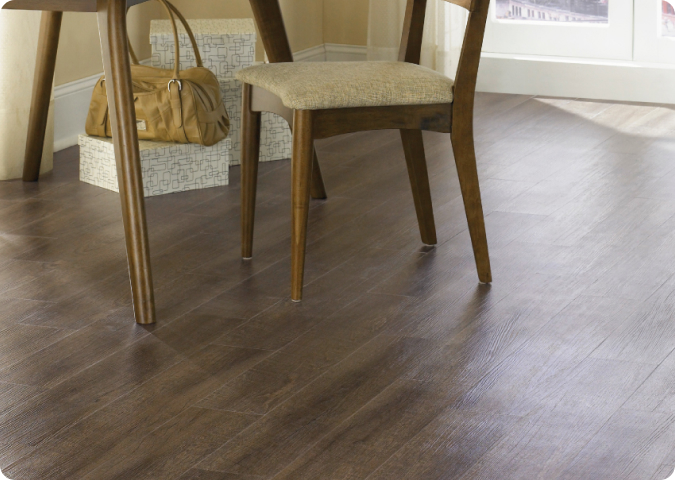 Room scene EmpireToday moving furniture carefully